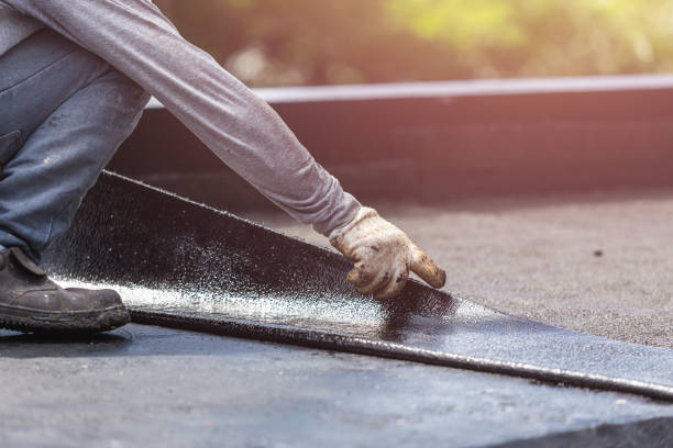 Professional Waterproofing technician working in Russells Point, OH